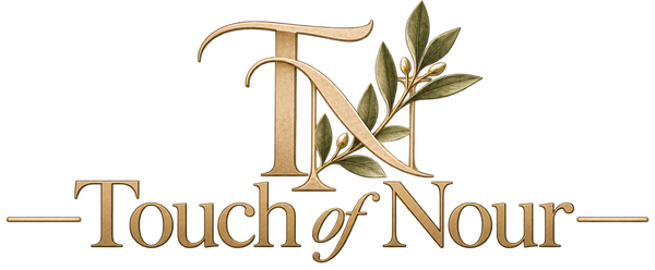 Touch of Nour gold botanical monogram and wordmark